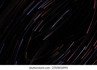 abstract background with red and blue lines forming a vortex
