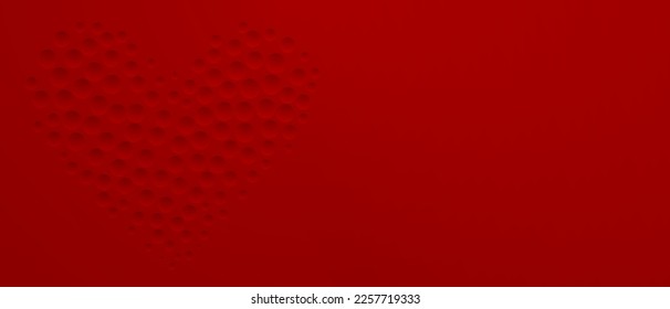 Abstract background in red colors with many concave small circles, arranged in a heart shape