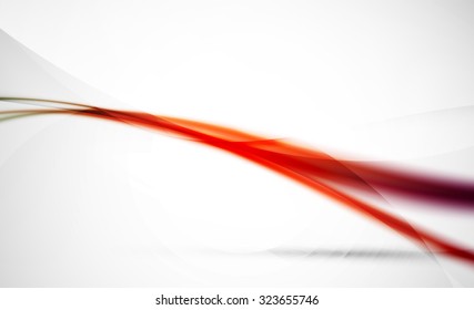 Abstract background. Red wavy blurred line with light and shadow effects in the air