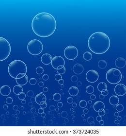 Abstract background shows the bubbles are rising from the sea or ocean on a blue background.