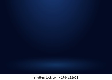 Abstract background. The studio space is empty. With a smooth and dark blue color.