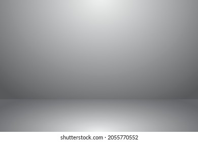 Abstract background. The studio space is empty. With a smooth and soft gray color.