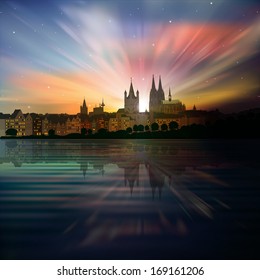 abstract background with sunrise and silhouette of Koln