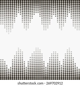Abstract background vector halftone effect gray dots on a light background.