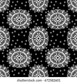 Abstract background. Vector illustration. Ethnic mandala monochrome seamless pattern. Indian ornament.