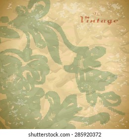 Abstract background of vintage foliage pattern on faded worn paper