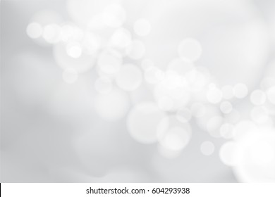 Abstract background with white bokeh effect.Template of blurred defocused lights in spring color for greeting, invitation card, banner and poster to celebrate on holiday season in vector illustration.