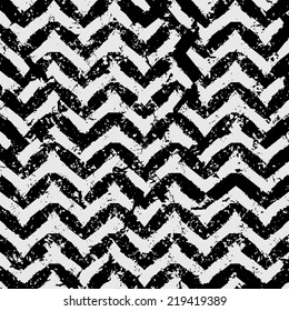 Abstract background with zig-zag stripes in grunge style. Vector illustration. 