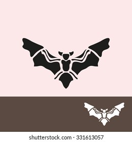 Abstract bat symbol, design element. Can be used for invitations, greeting cards, scrapbooking, print, labels, emblems, manufacturing. Animal theme