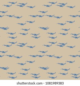 Abstract beige and different shades of blue background as UFO camouflage. Seamless repeat bright pattern usable as camo, wallpaper, backdrop or for print for textile or wrapping paper