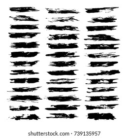 Abstract big set black short textured brush strokes isolated on a white background
