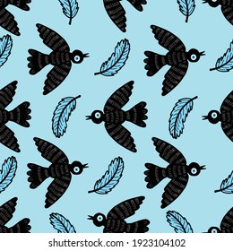 Abstract black birds and feathers on a blue background.Pattern for greeting cards, decor, textile, fabric, background, Wallpaper,wrapping paper.