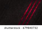 Abstract black carbon background with red dynamic slanted lines. Mosaic triangular pattern. Geometric template for aggressive corporate identity of business companies, sports clubs, bars, night clubs.