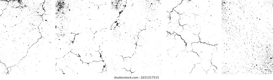 Rachaduras pretas abstratas e manchas dispersas em um fundo branco.