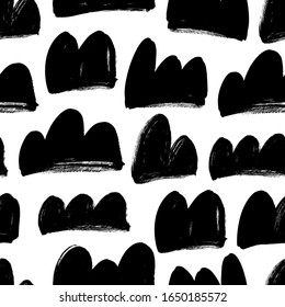 Abstract black paint shapes vector seamless pattern. Dry brush stroke clouds, semicircles, double and triple semi spheres hand drawn doodles. Grungy wallpaper design, creative textile print
