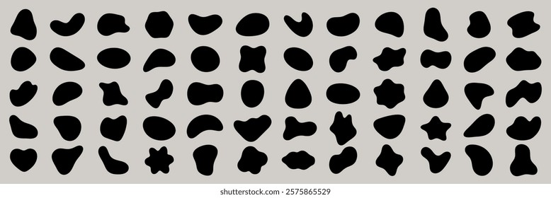 Abstract black shapes on a gray background. Various abstract forms, abstract patterns, and abstract silhouettes create a modern, artistic design. Black shape vector set.