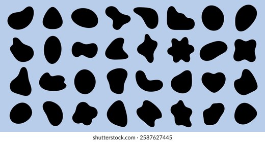 Abstract black shapes on a light blue background. Various organic shapes, abstract and irregular. Black shapes contrast with blue. Abstract art, organic forms. Black shape vector set.