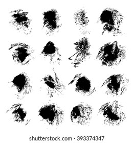 Abstract black textured ink smears isolated on a white background