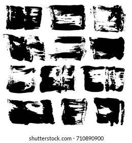 Abstract black textured wide brush strokes isolated on a white background