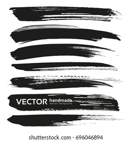 Abstract black thick vector brush strokes isolated on a white background