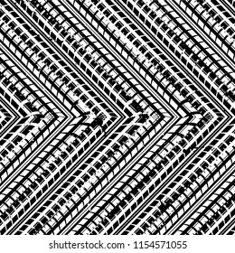 Abstract black and white background with ink blots and tire tracks
