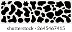 Abstract black and white cow pattern with irregular shapes. Cow pattern with black spots. Irregular shapes in cow pattern design. Black and white cow pattern. Black shape vector set.
