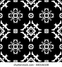 Abstract black and white floral ornament seamless pattern for wallpapers and background.