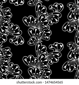 Abstract black and white floral pattern on a black background. Seamless pattern.