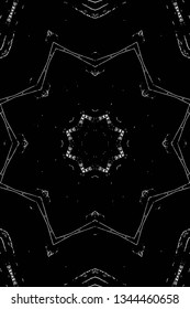 Abstract black and white painted kaleidoscopic background. Futuristic psychedelic hypnotic grunge backdrop pattern with texture. Ethnic floral ornamental mandala. Vintage geometric vector overlay