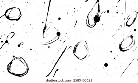 An abstract black and white pattern featuring various circular shapes and splatters, creating a dynamic and artistic composition.