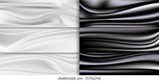 Abstract black and white satin background.  Creased cloth for fashion.