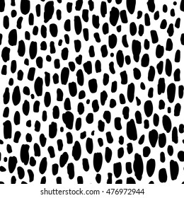 Abstract black and white vector pattern. Brush spots seamless texture.
