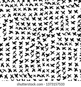 Abstract black and white vector seamless pattern with hand drawn doodle small crosses for textile, clothing and backgrounds