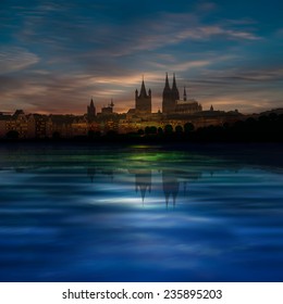 abstract blue background with clouds and silhouette of Koln