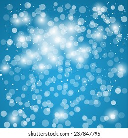 abstract blue background with sparkles and circles