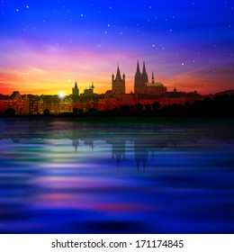 abstract blue background with sunset and silhouette of Cologne