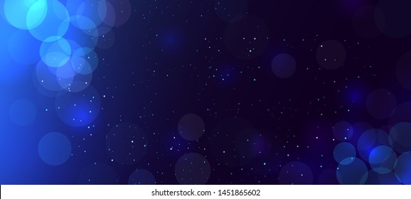 Abstract blue bokeh background with circles. Defocused. Glitter. Decoration element for Christmas and New Year eve holidays celebrations, greeting cards, banners, posters. Copy space
