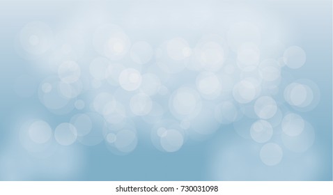 Abstract blue circular bokeh background.