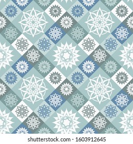 Abstract blue geometric seamless pattern with flowers and stars.