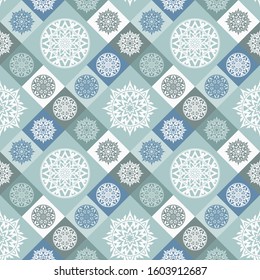 Abstract blue geometric seamless pattern with flowers and stars.