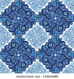 Abstract blue geometry seamless pattern with floral rhombuses.