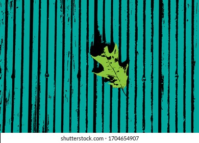Abstract blue green background. Withered leaf on a wooden floor.