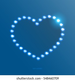 Abstract blue heart shape of light bulbs or led diodes. Bright design element for decoration holidays valentine's day.