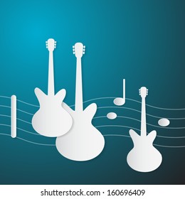 Abstract Blue Music Background. Guitars and Staff Made from Paper.