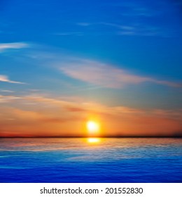 abstract blue nature background with sea sunset and clouds