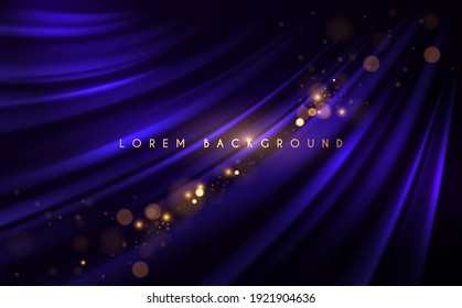 Abstract blue silk background with gold glow effect