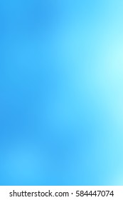 Abstract blue smooth blur background for any design to put over. Vertical format.