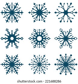 Resumen de copo de nieve azul aislado en fondo blanco.