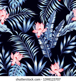 Abstract blue tone tropical leaves and pink lily flowers on the black background. Seamless realistic vector composition, trendy botanical pattern