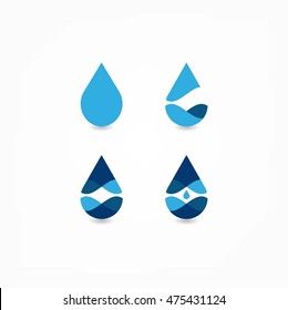 Una gota total de agua azul. Conjunto de logotipos de vectores